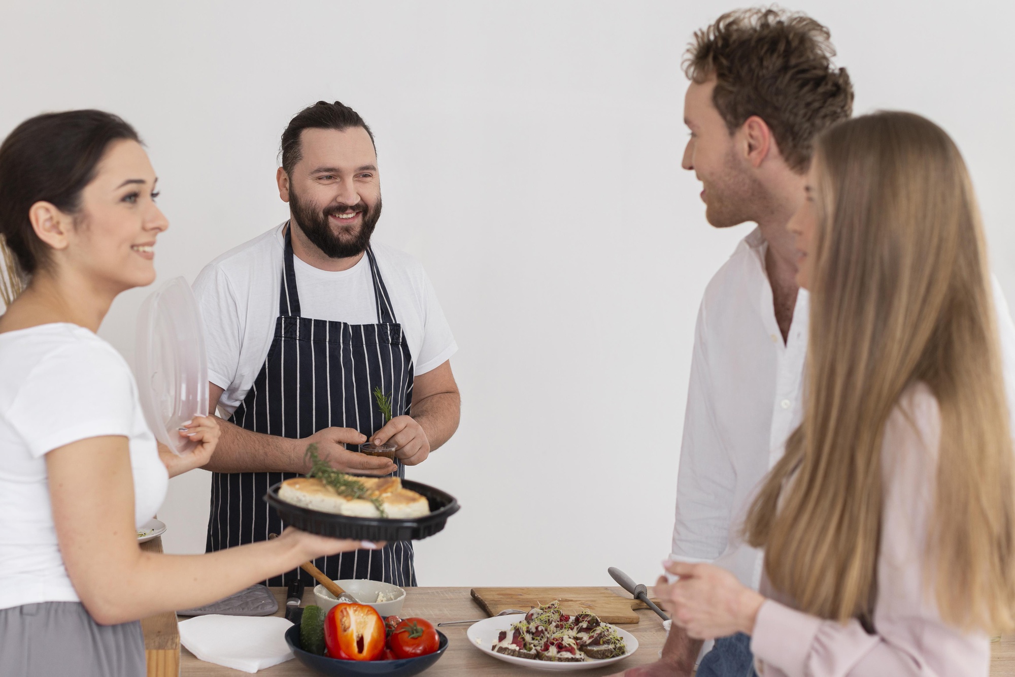 Instructor demonstrating plating to a small group